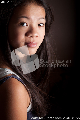 Image of Portrait of a young teenager girl in studio