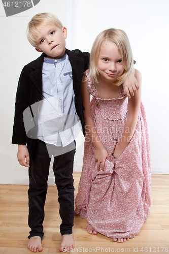 Image of Portrait of a brother and sister in studio