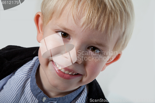 Image of Portrait of a scandinavian young boy in studio