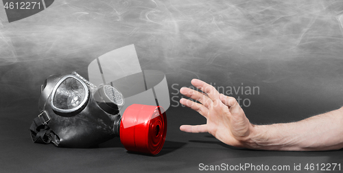 Image of Man in room filled with smoke, trying to reach for vintage gasma