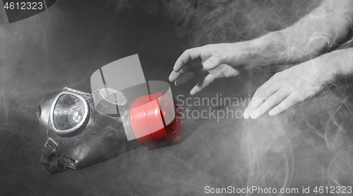 Image of Man in room filled with smoke, trying to reach for vintage gasma