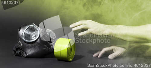 Image of Man in room filled with smoke, trying to reach for vintage gasma