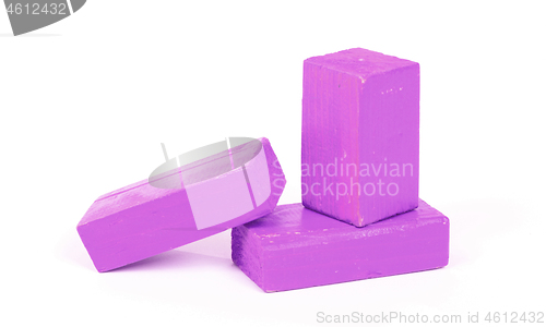 Image of Vintage purple building blocks isolated on white