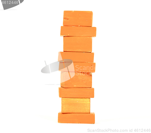 Image of Vintage orange building blocks isolated on white