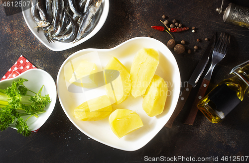 Image of potato with fish