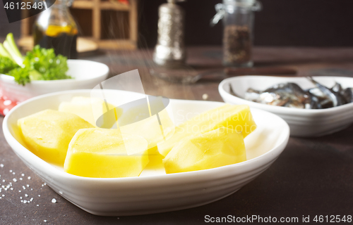 Image of potato with fish