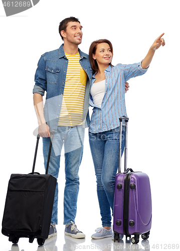 Image of happy couple of tourists with travel bags