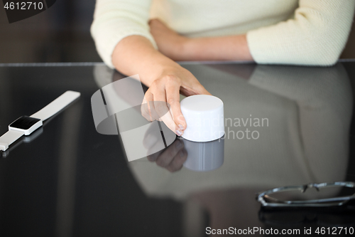 Image of close up of woman using black interactive panel