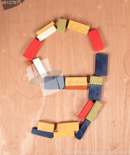 Image of Old wooden blocks, toghether they make the number 9