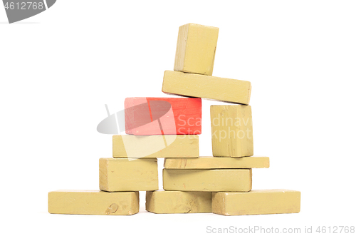 Image of Vintage green building blocks isolated on white, one standing ou