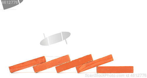 Image of Vintage orange building blocks isolated on white