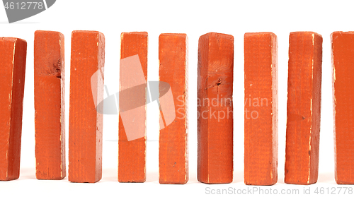 Image of Vintage orange building blocks isolated on white