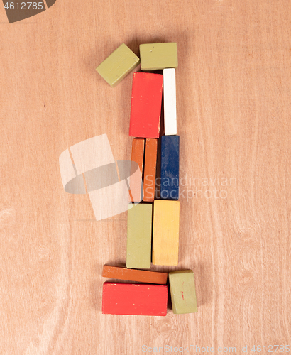 Image of Old wooden blocks, toghether they make the number 1