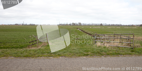 Image of Open metal farm gate