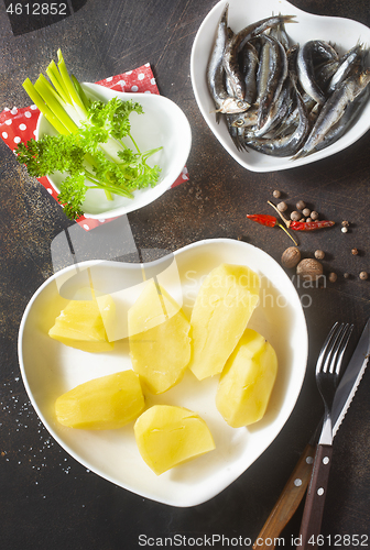 Image of potato with fish