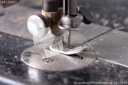 Image of Antique, vintage sewing machine close-up