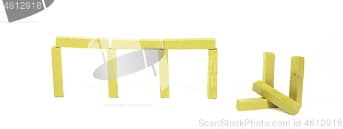 Image of Vintage yellow building blocks isolated on white