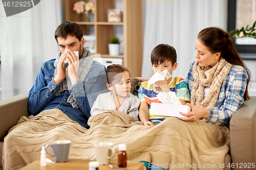 Image of ill family with children having flu at home