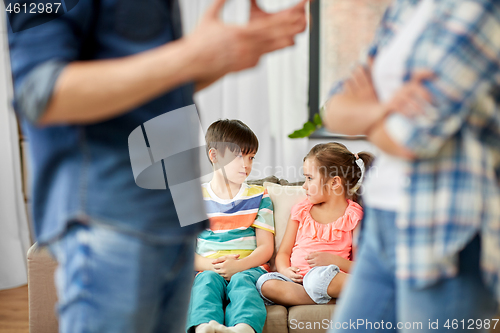 Image of children watching their parents quarreling at home