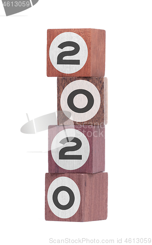 Image of Four isolated hardwood toy blocks, saying 2020