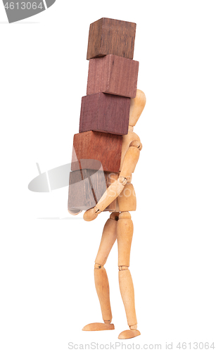 Image of Wooden mannequin carrying wooden hardwood blocks