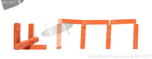 Image of Vintage orange building blocks isolated on white