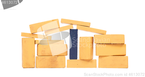 Image of Vintage orange building blocks isolated on white, one blue one