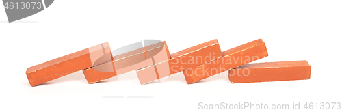 Image of Vintage orange building blocks isolated on white