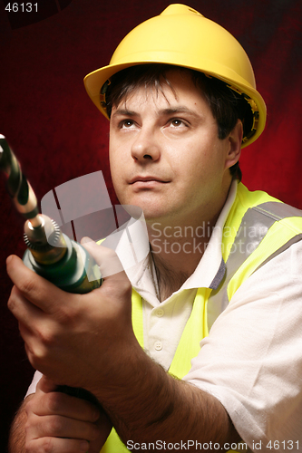Image of Tradesmen with a drill