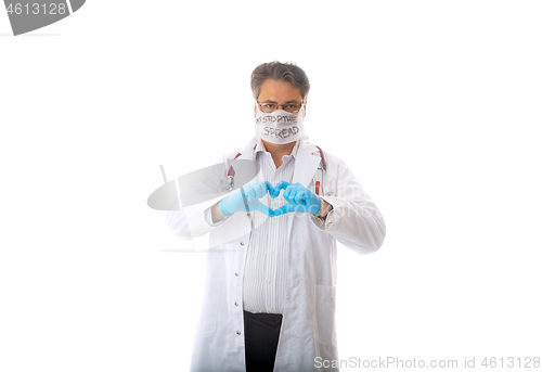 Image of Doctors gloved hands make a heart symbol