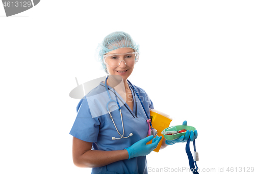 Image of Friendly nurse or pathologist holding a kidney dish of blood tub