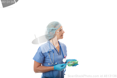 Image of Hospital nurse or pathologist holding blood test tubes and needl