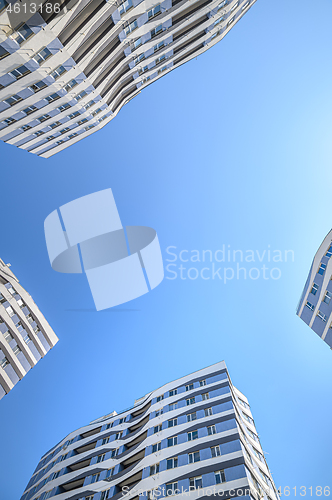 Image of Wide angle shot of new apartments buildings exterior