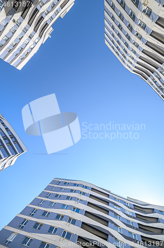 Image of Wide angle shot of new apartments buildings exterior