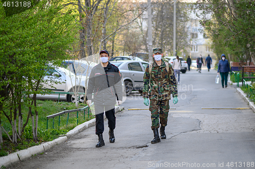 Image of Mixed carabineri and military patrol in residential area of Chisinau, Moldova during covid-19 virus threat