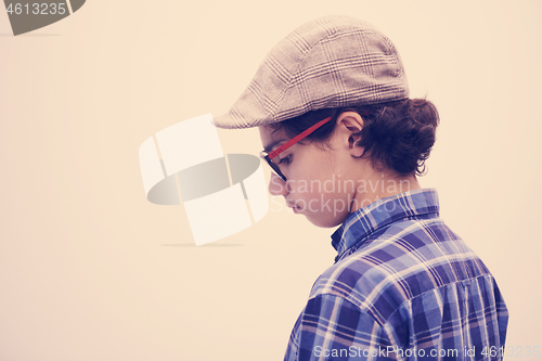 Image of portrait  of smart looking arab teenager with glasses