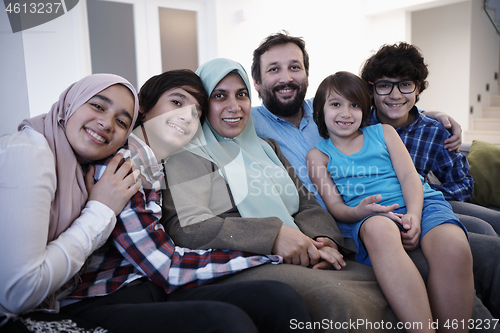 Image of muslim family portrait  at home