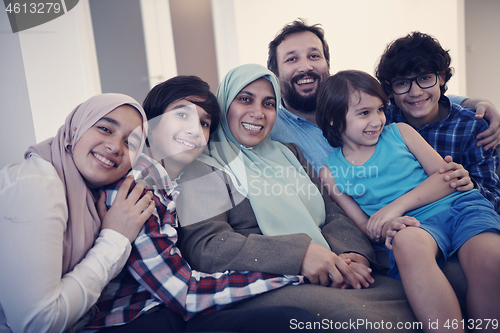 Image of muslim family portrait  at home