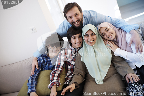 Image of muslim family portrait  at home