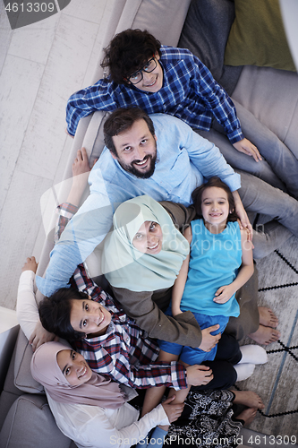 Image of muslim family portrait  at home top view