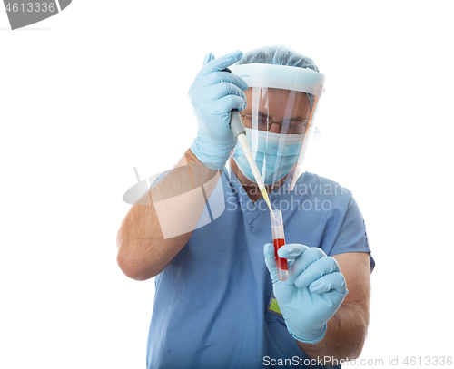 Image of Healthcare worker pipetting a patient sample