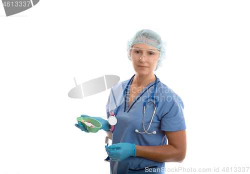 Image of Nurse pathologist holding blood tubes for medical testing