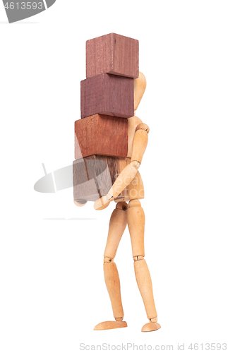 Image of Wooden mannequin carrying wooden hardwood blocks