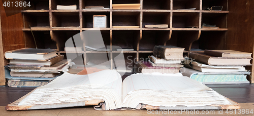 Image of Very old desk, full of old books and old paper