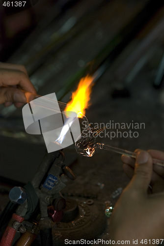 Image of Artist making a bird of glass