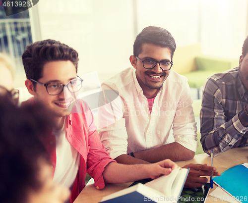 Image of group of high school students sitting at table