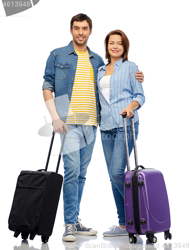 Image of happy couple of tourists with travel bags