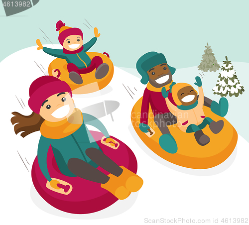 Image of Multiethnic family sliding down the hill on tubes.