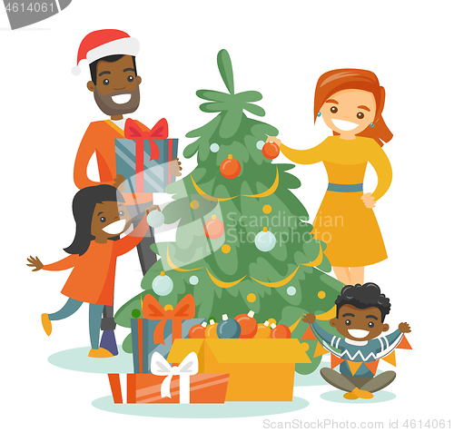 Image of Multiethnic family decorating the Christmas tree.