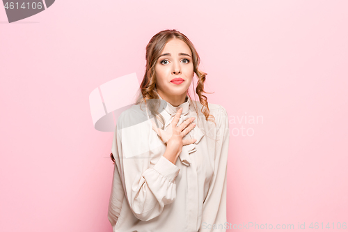 Image of Indoor shot of regretful woman looks gloomy and desperate